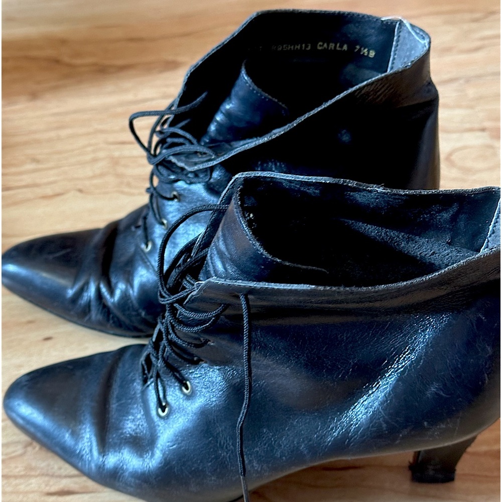 Black lace up booties. Super cute and comfy. 7.5